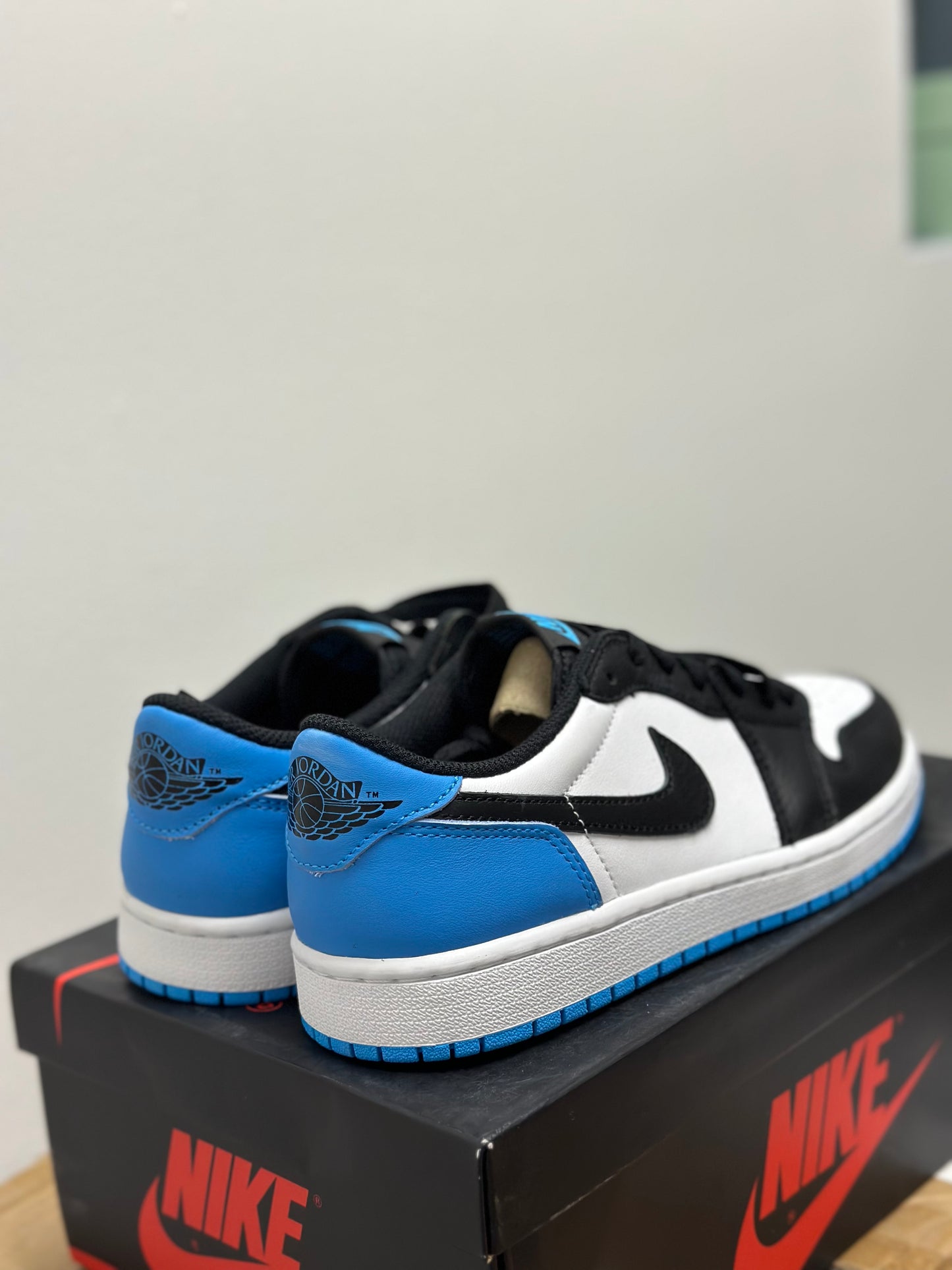 Jordan 1 Retro Low OG Black Dark Powder Blue